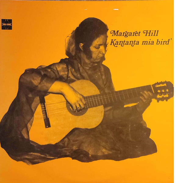 Album cover: Margaret Hill - Kantanta mia bird', containing a photo of Hill playing a classical guitar