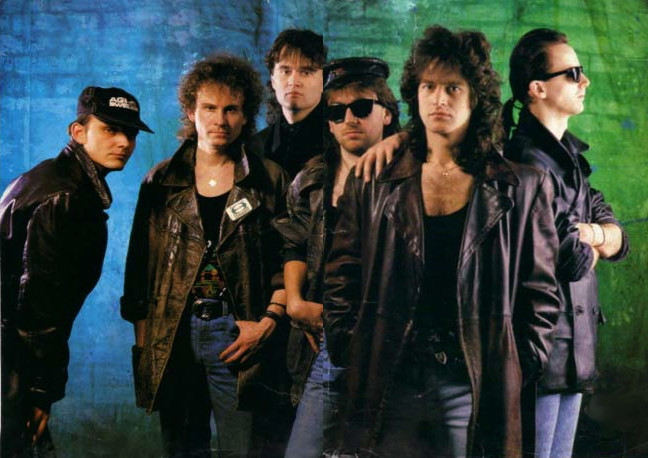Publicity shot of the group Team. Six men in leather jackets and jeans.