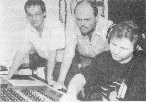 Gunter Koch and Rainer Conrad (standing) and Bernd Hasebrink (sitting) at a studio mixing desk